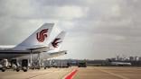 china eastern and air china tail fins on tarmac